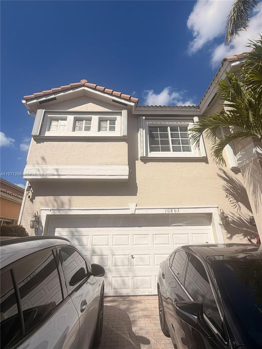 Great location in the heart of Doral this spectacular two story house with 3 bedrooms 2 baths and 1 half bath. Two car garage, gated community, close distance to A plus school of Doral. Golf course, supermarket, restaurants and parks. Property available in April.