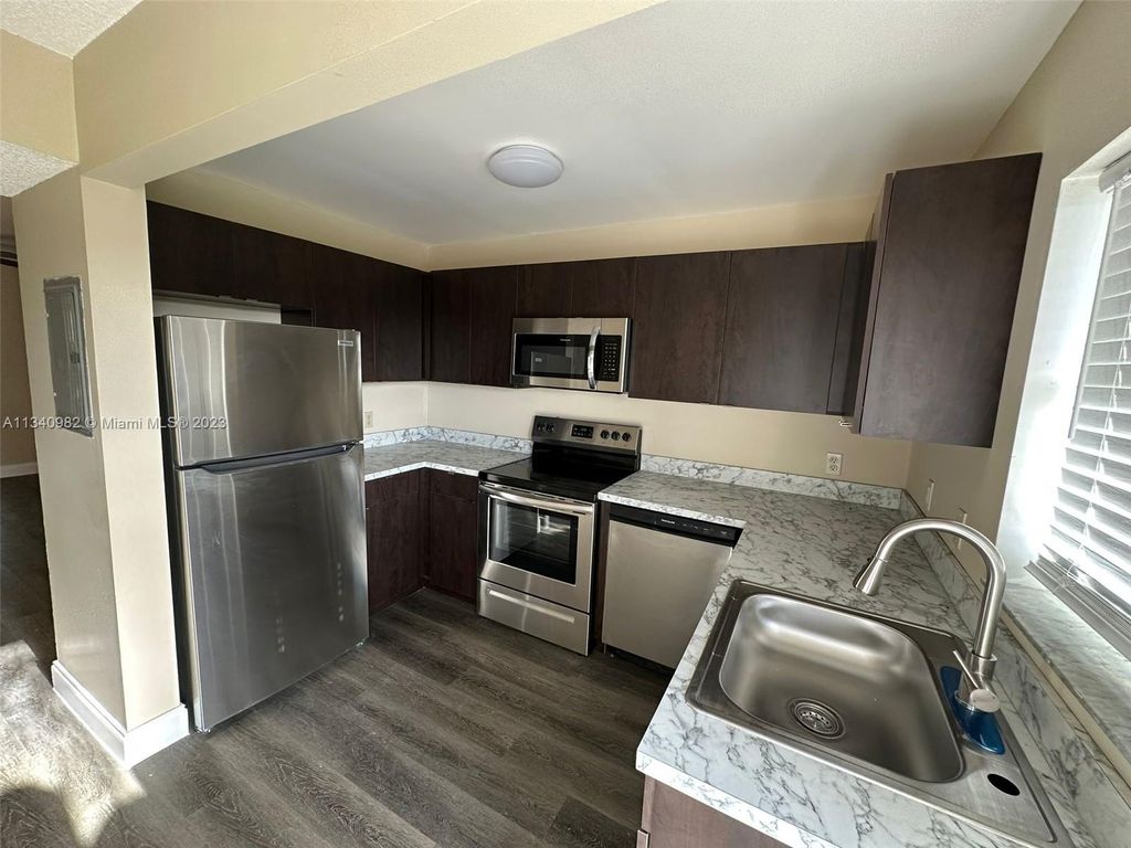 Photo of 605 Ixoria Ave #15, Fort Pierce, FL 34982 (MLS # A11340982)