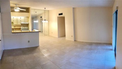 Photo of 9674 S Belfort Cir #202, Tamarac, FL 33321 (MLS # A11781618)