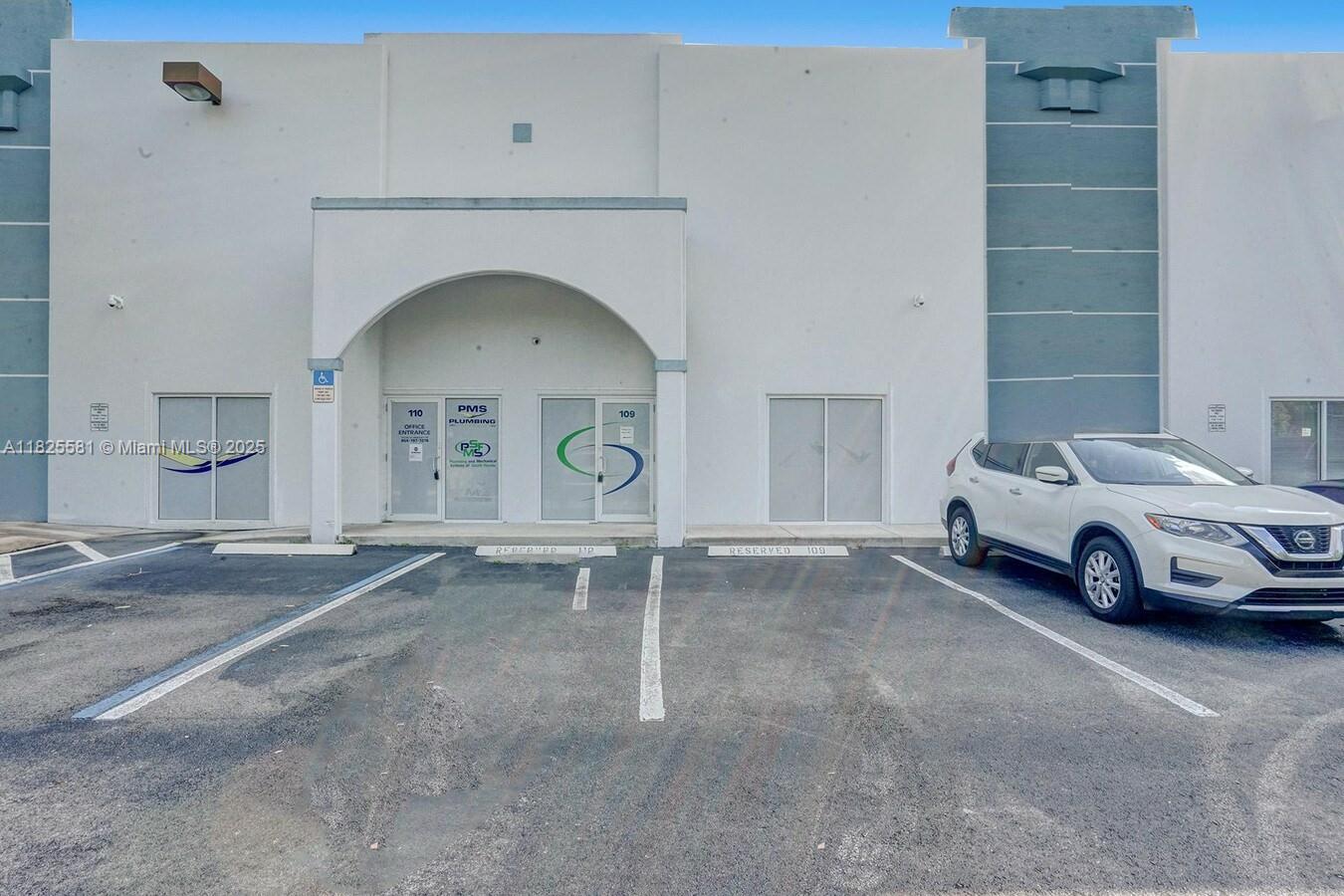 Discover this versatile office/warehouse condo in the thriving Southwest Broward market, offering an ideal space for your business needs. Featuring a spacious 22-foot ceiling height, the property includes two street-level loading doors measuring 10 ft wide by 12 ft high for efficient logistics. The facility is equipped with 3-phase electrical power and 200 AMPS, supporting heavy machinery and operations. The space comprises 30% office area and 70% warehouse/storage, all fully air-conditioned for comfort. The office suite includes a break room with kitchen, a reception and waiting area, conference room, and bullpen office. Conveniently located with easy access to Pines Blvd, I-75, and Okeechobee Rd (US 27). This property combines functionality with accessibility for your growing enterprise.
