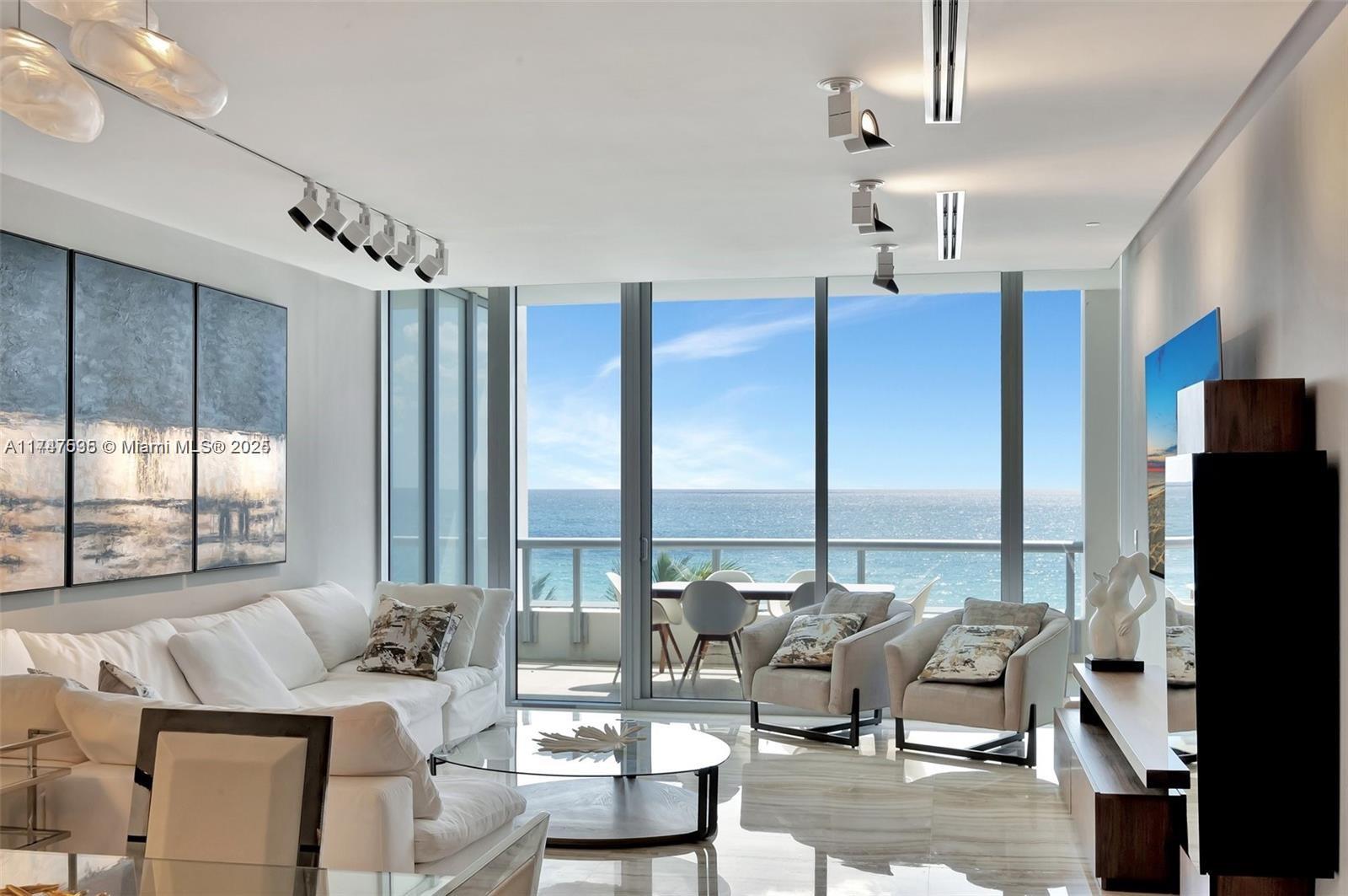 Welcome to the Corner Beach House at the Carillon! Nestled at tree-top level, you'll be surrounded by palm trees with the ocean just behind. Located on the 4th floor, the same level as the spa and gym, this beach house offers convenience and luxury.
The Carillon boasts an award-winning spa, four pools, a restaurant, café, grill, and more. The apartment comes fully furnished and includes everything you need to move right in. The primary bedroom offers an expansive view, while the second and third bedrooms overlook the ocean and lush green trees. With 11-foot ceilings, the space feels open and airy.
This property can be sold with or without a tenant for the next season. You'll fall in love with it! Virtual tour and more information available. Come on down!