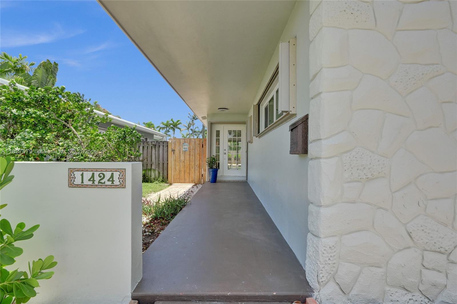 Welcome to 1424 Adams St — a beautifully updated 2-bed, 2-bath home in coveted Hollywood Lakes neighborhood. This stylish single-story offers 1,362 sq ft of thoughtfully designed space with porcelain tile floors, quartzite countertops, smart toilets and a carrara marble sink in the primary bath. The kitchen features brand-new GE stainless appliances and a new washer and dryer. Enjoy a bright Florida room opening to a private, fenced backyard—great for entertaining. Includes rear garage and driveway parking for two cars provide flexibility and convenience. Just 1.9 miles to Hollywood Beach, near downtown, Aventura Mall, and FLL airport. Walk to Jefferson Park with courts, playgrounds, and more. This move-in-ready gem blends comfort, style, and location!