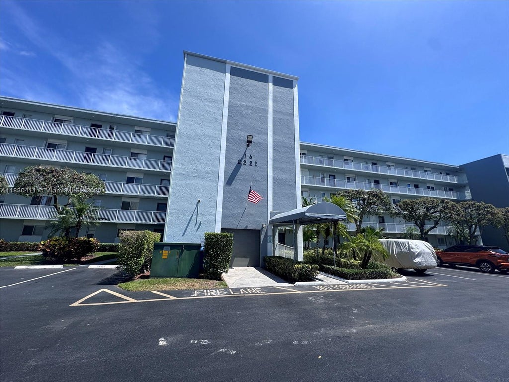 Photo of 2228 N Cypress Bend Dr #407, Pompano Beach, FL 33069 (MLS # A11830411)