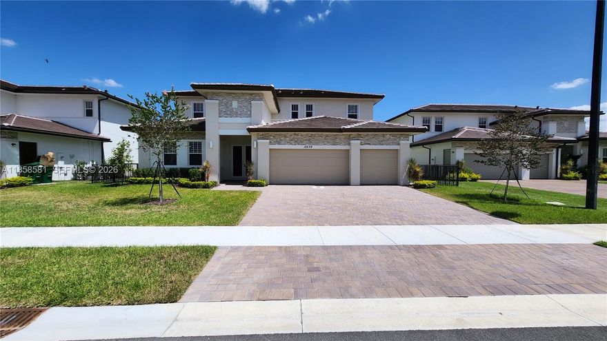 Brand new 2024 home with 5 bedrooms and 4.5 bathrooms, located in a prime Davie neighborhood between Flamingo and Griffin Road, with quick access to I-75. This home offers a peaceful water view from the backyard, creating a serene atmosphere. The first floor has polished marble flooring, while the stairs and second floor have modern vinyl. The kitchen is designed with high-end finishes and a spacious island, perfect for hosting. The garage is upgraded with flake epoxy flooring for a clean and sleek look. Conveniently close to parks, schools, shopping, and dining. Schedule your showing today!