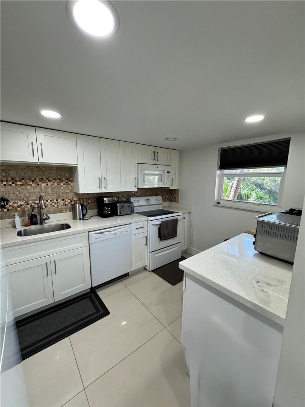 Photo of 10110 Boca Entrada Blvd #305, Boca Raton, FL 33428 (MLS # A11982293)