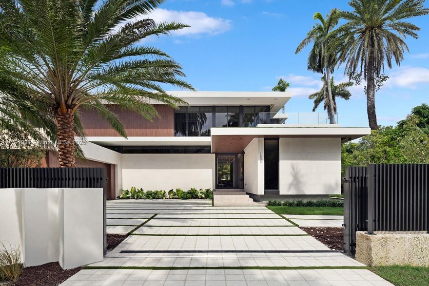 Discover tropical modern luxury in exclusive Sunset Island II. This brand new 6,000 SF tropical modern by Sunlight Homes and Preschel Bassan Studio offers 6 bedrooms including staff quarters with 7 full and 2 half bathrooms. The home showcases impeccable craftsmanship—from its stone clad facade to Boffi kitchens and imported stone and Spanish oak flooring. Flawless Interiors by Tamara Feldman boast Delta lighting , travertine, limestone and leathered marble slabs. Palatial Primary suite with his & hers baths and dressing rooms. Outdoor paradise awaits with a stunning pool, cold plunge, spa, and kitchen. Full Smart home as well as elevator and full generator. Perfectly positioned on a 12,000 sqft corner lot, enjoy privacy with abundant natural light and gorgeous sunset views.