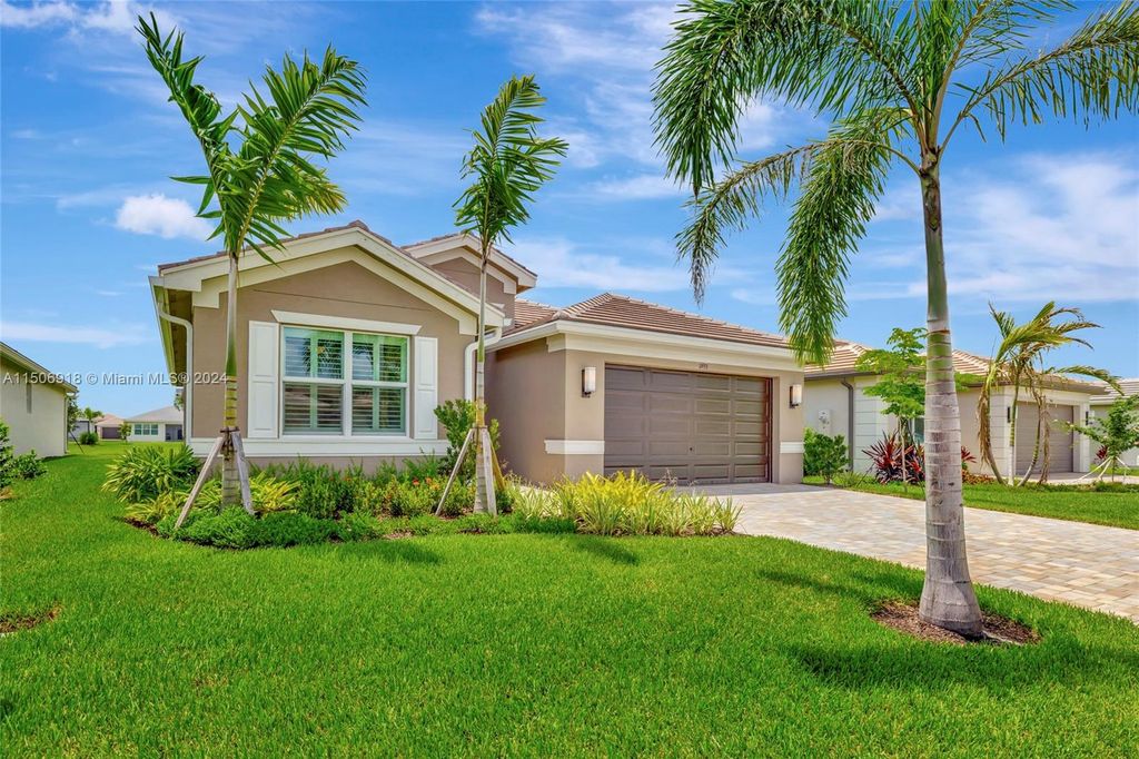 Photo of 11933 SW Coral Cove Pkwy, Port Saint Lucie, FL 34987 (MLS # A11506918)