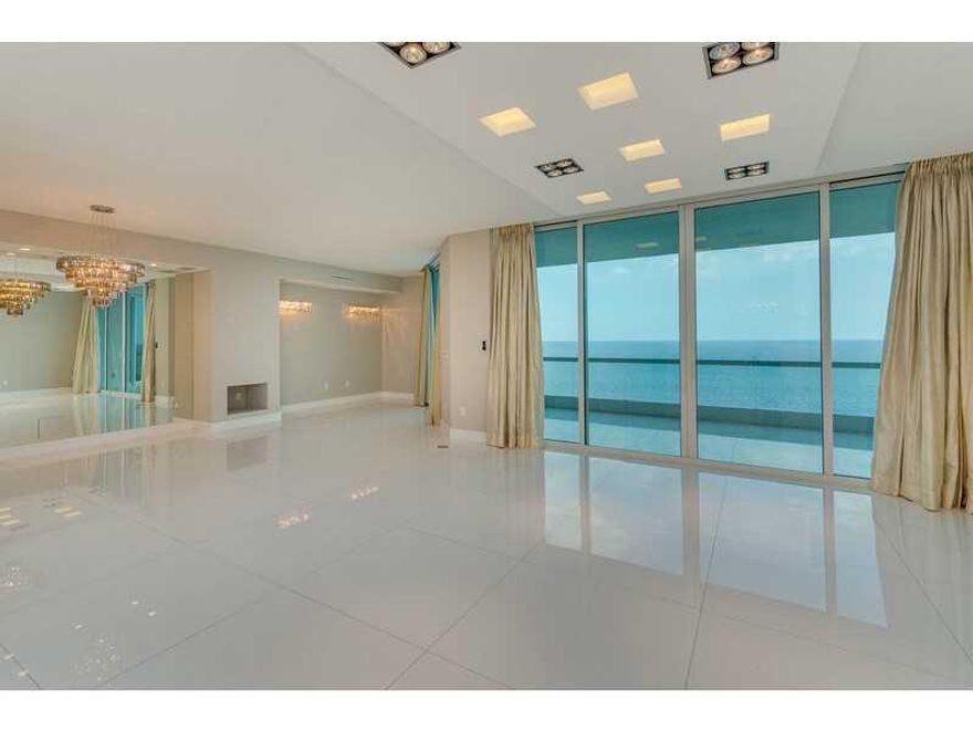 Luxurious oceanfront one of a kind home with magnificent direct ocean views from every room and to the Intercoastal. This magnificent residence has been crafted with the finest of details, no expense was spared.  Private elevator entry. Award winning 5-st ar community including ocean front 2 pools, 2 restaurants, a spa and salon rival five star hotel service.