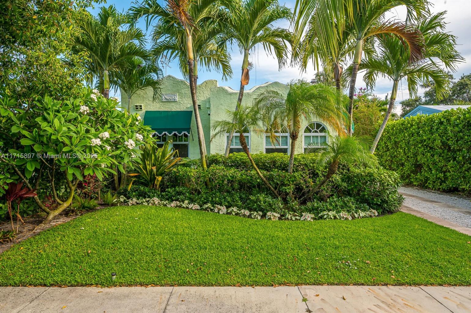 Welcome to your tropical retreat in historic Flamingo Park, where California Mission style meets Palm Beach charm. This beautifully remodeled Spanish villa blends Boho-chic elegance with modern comforts, perfect for families, sun seekers, and pet lovers. The main house features a cozy office nook, a welcoming living room with a decorative fireplace, a stylish dining area, and a chef's dream kitchen with updated appliances. Relax in the primary suite with its king-size bed and designer en-suite bathroom or the Zen-inspired twin bedroom. The private guest cottage offers a king bed, luxury bathroom, and kitchenette. Outside, unwind in the heated saltwater pool, dine al fresco, or let pets enjoy the fenced yard. Available monthly for season or off-season. Also available weekly.
