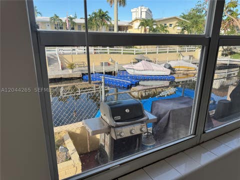 Photo of 1765 Venice Ln #4E, North Miami, FL 33181 (MLS # A12044265)