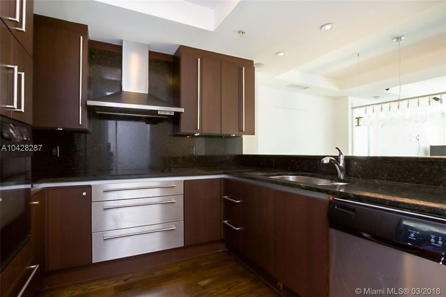 Beautiful apartment in the most sought after line in the building. This 2 bedroom, 2.5 bath features over 1,500 SF of living area with lots of natural light, expansive balcony with beautiful ocean view, split floor plan, and walk-in closets. Owner can enjoy the amenities of the Ritz-Carlton hotel, which include in-room dining, bar, pool, and many more. Within walking distance to CocoWalk, Parks, Movies, Marina, and the top schools.