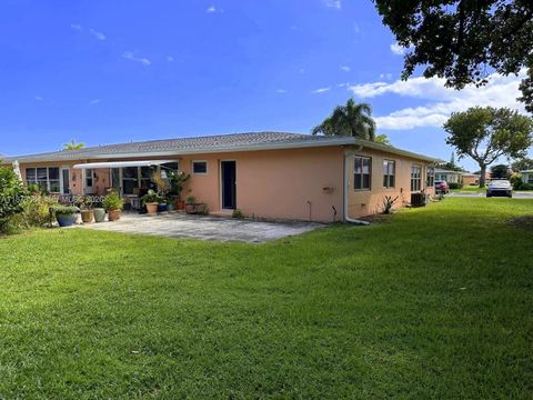 Photo of 285 N High Point Blvd #A, Boynton Beach, FL 33435 (MLS # A11878584)