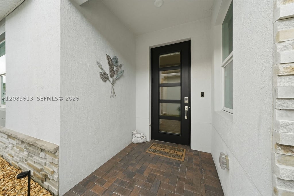 Photo of 11550 SW Viridian Blvd, Port St Lucie, FL 34987 (MLS # A12085613)
