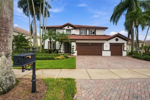 Photo of 1937 Timberline Rd, Weston, FL 33327 (MLS # A12097237)