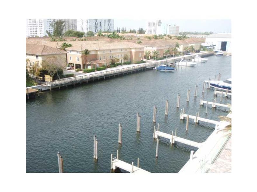 FANTASTIC AND SPACIOUS TWO STORY APARTMENT WITH WATER VIEWS. FULL BATH + DEN ON 1ST FLOOR, MASTER ON SECOND ITALIAN KITCHEN, ABSOLUTE WHITE PORCELAIN THROUGHOUT, CALIFORNIA CLOSETS, ROLLER SHADES.