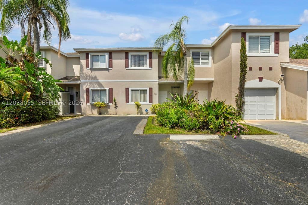 Photo of 783 NW 42nd Pl, Deerfield Beach, FL 33064 (MLS # A12038055)