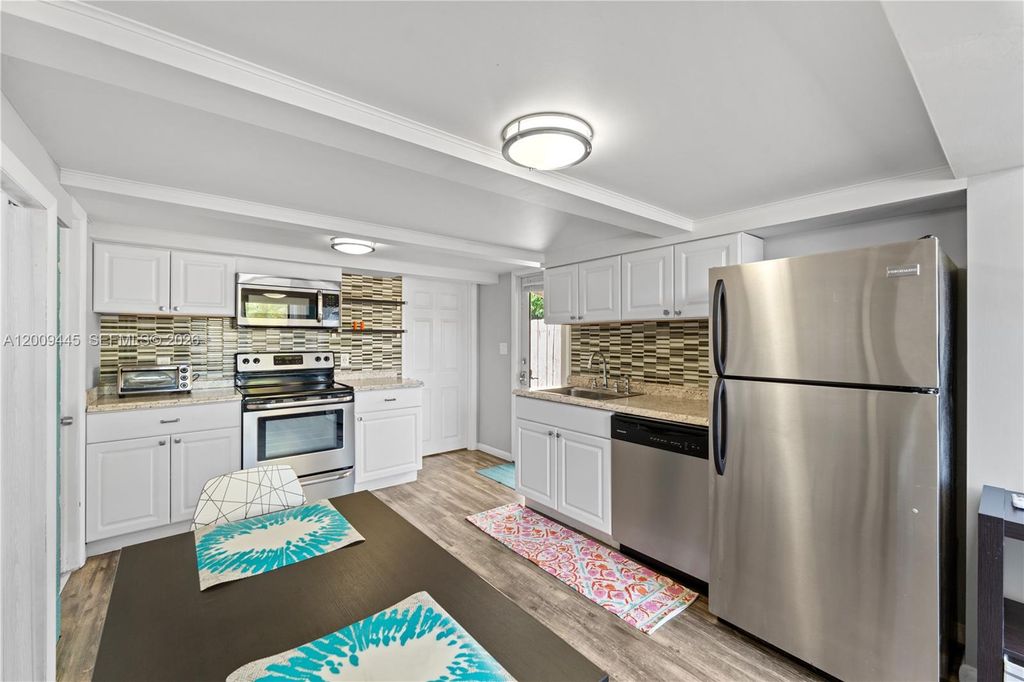 Photo of 2618 Monroe St #B, Hollywood, FL 33020 (MLS # A12009445)