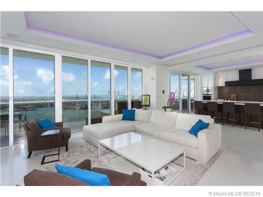 Enjoy sunrises & sunsets from this ultra-modern penthouse at the Murano Grande. Endless walls of glass & 2 balconies provide panoramic views to the bay, ocean and city. Exquisite quartz floors, 2,974 SF of open luxury living/family areas, chef's kitchen, recessed ceilings w/cove lighting, Savant system "Smart Home". Sumptuous master suite w/full his/hers walk-in closets & magnificent bath with oversized chroma-therapy spa & sunken waterfall tub.  Spectacular views, impeccable décor/5-star Murano.