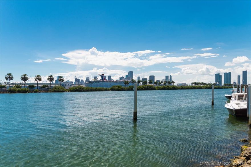 Oversized 30,000 sf vacant lot on Palm Island with direct Miami skyline views & 100 ft of Waterfront. One of the few large vacant lots available on Miami Beach, priced at only $205 per sf. Approved plans for a brand new modern home. Located on exclusive, guard-gated Palm Island across from the park with tennis, basketball & handball courts, as well as children's playground. Minutes away from South Beach & downtown Miami. Lush tropical landscape with majestic royal Palm trees.