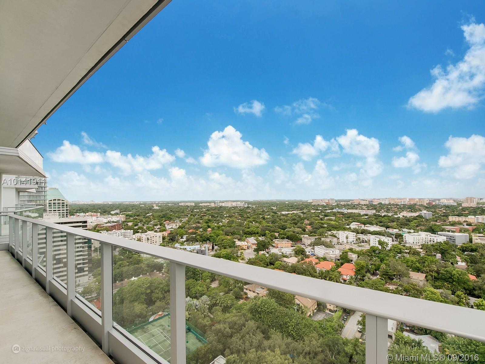 Endless bay and city views from this spectacular corner unit at Grovenor House. Amazing split floor plan with oversized spaces. Formal living and dining with breathtaking bay and marina views. Beautiful Italian kitchen with breakfast area that opens to family room featuring spectacular city & downtown views. Master plus three additional bedrooms, each with their private bath. Building amenities include infinity pool with cabanas, spa, tennis, gym, library, billiard room.Walking distance to Coconut Grove