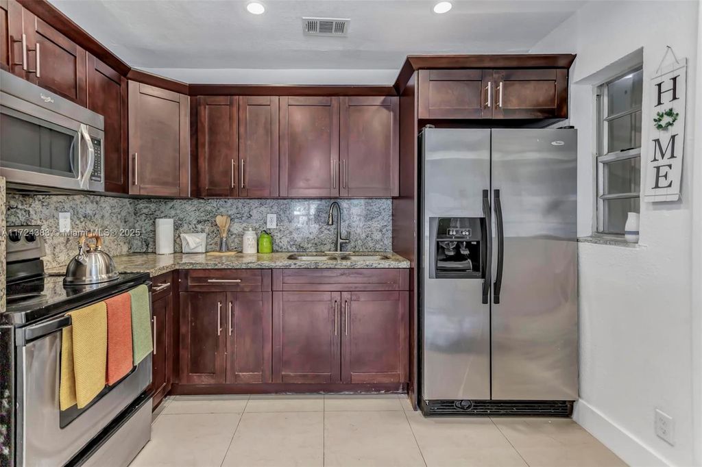 Photo of 2714 NW 13th St #2714, Fort Lauderdale, FL 33311 (MLS # A11724383)