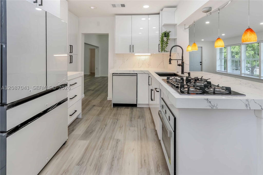 Photo of 1516 Jefferson St, Hollywood, FL 33020 (MLS # A12087041)