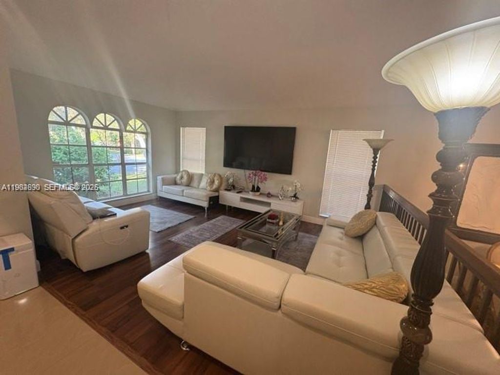 Photo of 4520 NW 52nd St, Coconut Creek, FL 33073 (MLS # A11982690)