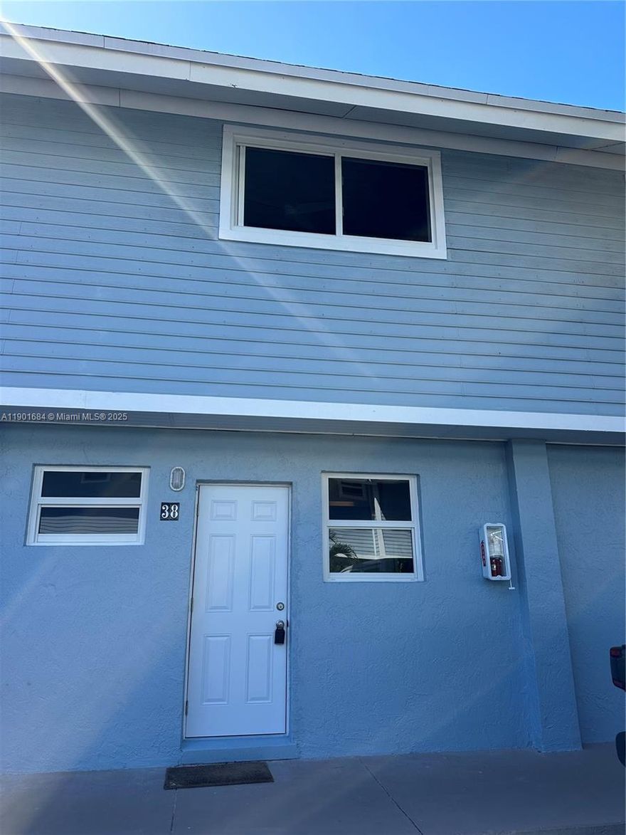 Resort living in the beautiful Key Biscayne, walking distance to the beach, shops, park and restaurants! This completely remodeled townhouse with impact windows, new A/C, kitchen and bathrooms is ready for a family to call it home! Two bedrooms one and half bathroom with a loaf is perfect for a couple or family.