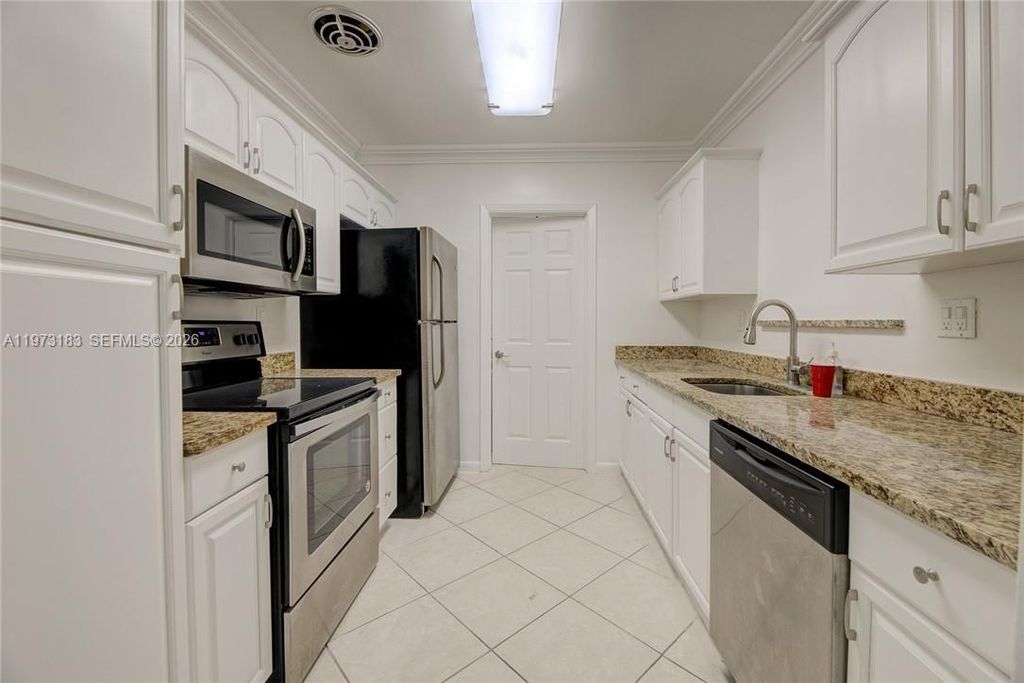 Photo of 1791 NE 46th St, Oakland Park, FL 33334 (MLS # A11973183)