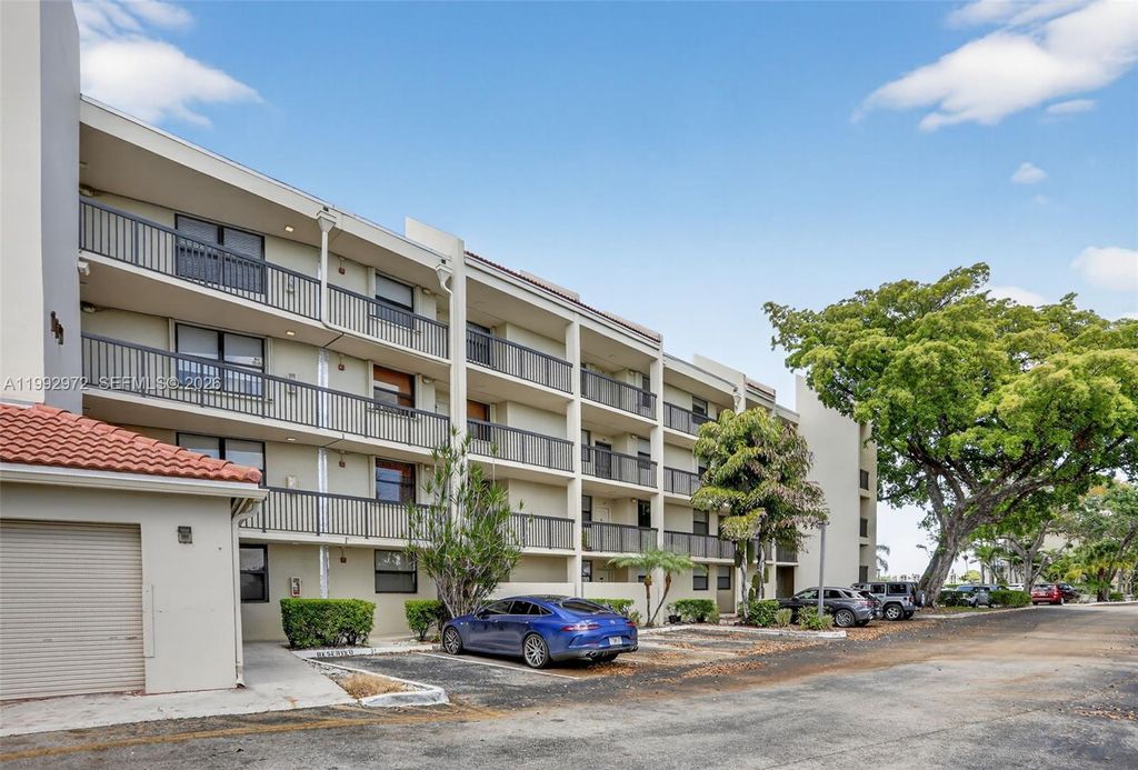 Photo of 117 Lake Emerald Dr #409, Oakland Park, FL 33309 (MLS # A11992972)