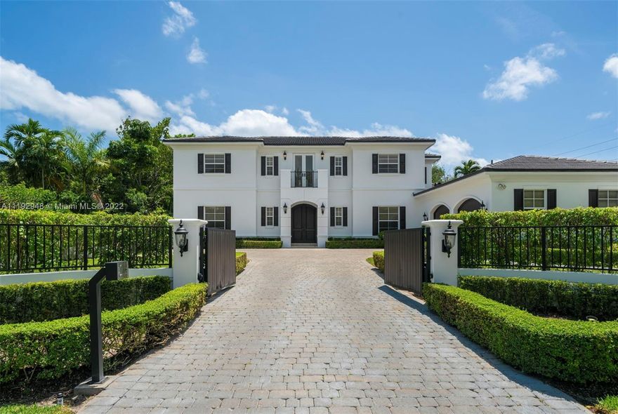 This timeless and gorgeous home designed and built by Giorgio Balli features 6 bedrooms, 7 full and 1 half bathrooms, and 7,960 square feet of immaculate living space. The exquisite, light-filled interior areas include a living room with a double-sided fireplace, office, billiards room, dining area and family room. The chef’s kitchen has Calacatta gold countertops, custom island and top of the line appliances. A main suite retreat has 2 large walk-in closets, balcony and a modern spa bath with dual separate vanities. Exquisite grounds include a patio, pool with jacuzzi and summer kitchen with a brick oven and alfresco dining area.  A true contemporary gem in South Miami, located on a quiet street and only a few minutes away from excellent schools, restaurants, shops and main highways.