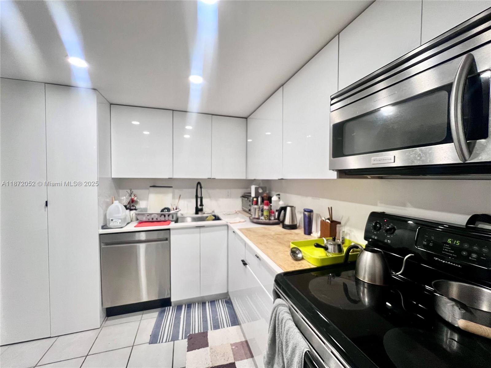 This beautifully remodeled 1st-floor unit features 2 spacious bedrooms, 2 updated bathrooms, and a versatile enclosed patio room. Enjoy luxury vinyl wood-look flooring throughout, a fully renovated kitchen with modern finishes, and freshly painted interiors that create a bright and inviting atmosphere. Impact windows throughout. Washer and dryer in unit. Close to Fort Lauderdale airport, beaches and Las Olas. Community Pool.