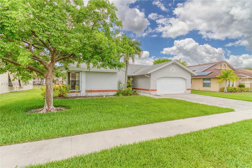 Photo of 10360 NW 31st Ct, Sunrise, FL 33351 (MLS # A12028614)