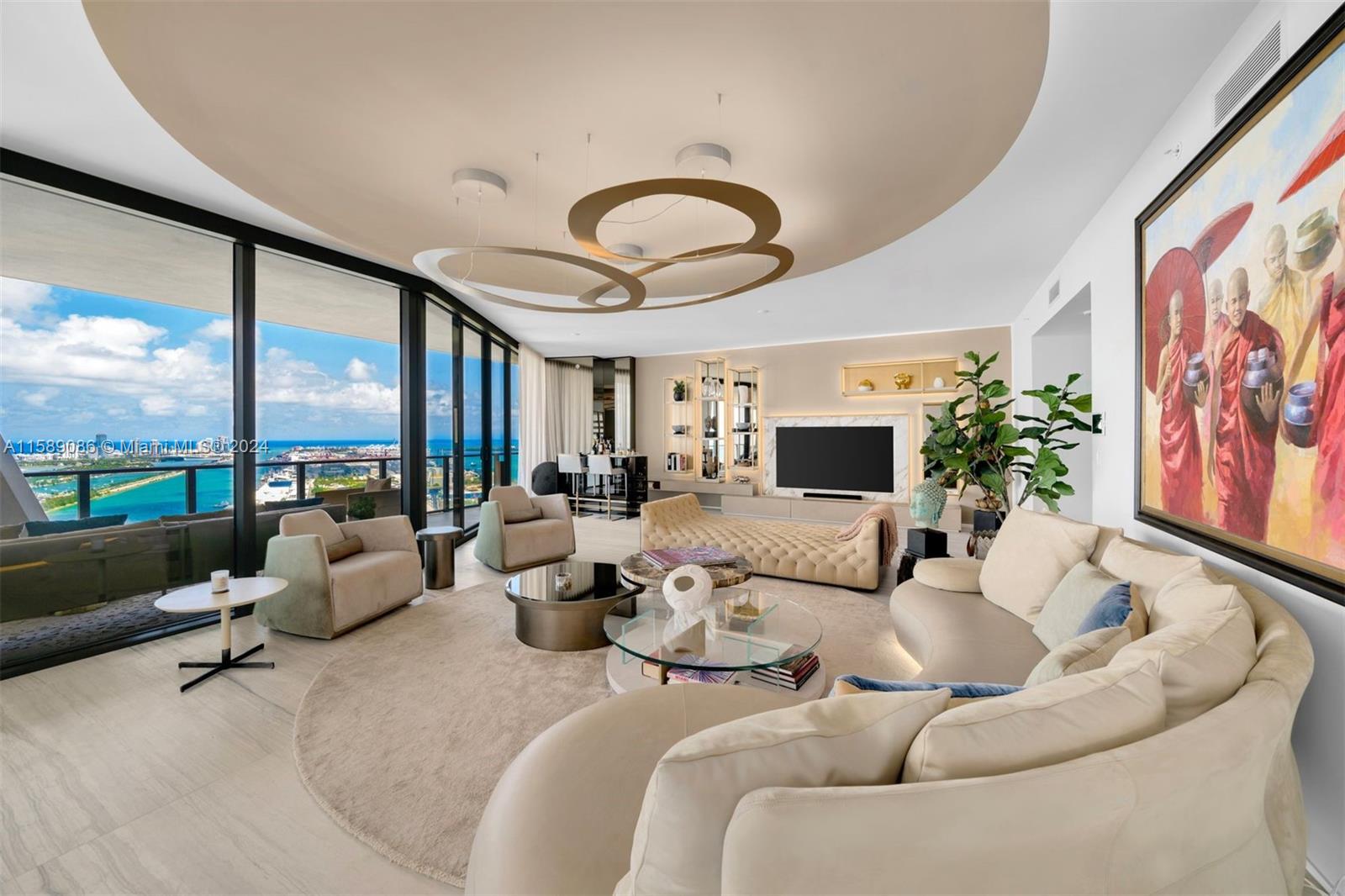 The most spectacular residence available at One Thousand Museum by Zaha Hadid. Curated & Designed by Morada with highly customized details throughout. This half-floor residence features a flow-through floor plan with unobstructed Biscayne Bay and Atlantic Ocean views. Both east and west terraces span the entire width of the residence, which is a rarity. 4 bedrooms, 5.5 baths, including a private foyer, beautiful great room with custom ceilings & lighting, proper bar, service quarters, and an impressive Poliform Kitchen with Gaggenau & Sub-Zero appliances. First-Class amenities & service levels- fitness center & spa, theater, interior & exterior pools, and a 60th-floor sky lounge with the only private residential helipad. Unit includes Storage #44 on 7th Floor of Garage.