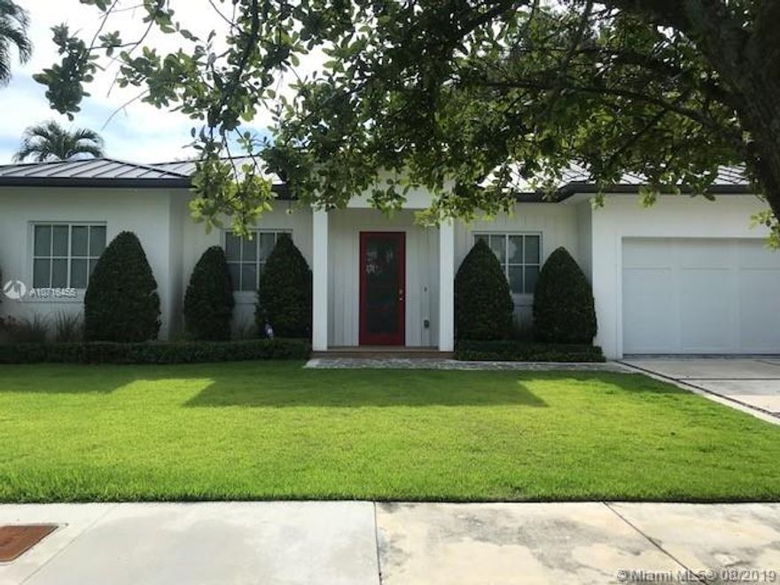 Enjoy living in Beverly Gardens! Charming Southern Home. Master suite w/3 custom made closets, leads to covered terrace w/gas Brick built-in BBQ & ceiling fans perfect for entertaining, also adjacent to Family Room & fully equipped kitchen w/white wood cabinets,Calacatta Marble countertop.All SS appl & gas stove/oven 
Laundry room w/High efficiency washer/dryer. Gas water heater. Central AC. All rooms w/custom made closets. All baths w/custom made cabinets, Marble tops.Surround Syst SONOS in/outdoor, Lutron Lighting Syst,Alarm Syst to be connected by tenants. Metal roof, all impact windows/doors. Electric blinds all windows. Porcelain wood-like floors throughout. Dble garage w/electric opener,Outdoor siding on walls enhances red front door & white picket fence. Recessed lights on overhang