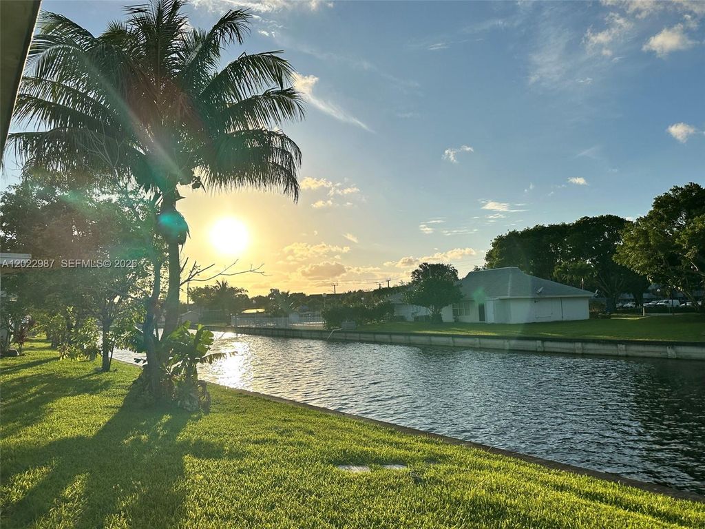 Photo of 8309 NW 59th Pl, Tamarac, FL 33321 (MLS # A12022987)