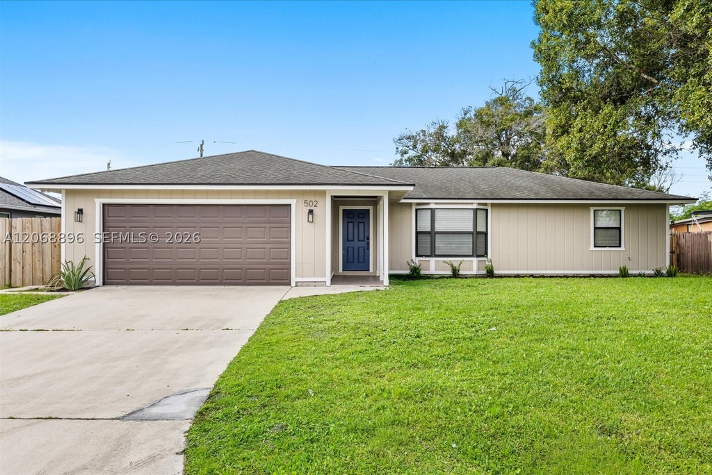 Photo of 502 NW Goldcoast Ave, Port St Lucie, FL 34983 (MLS # A12068896)