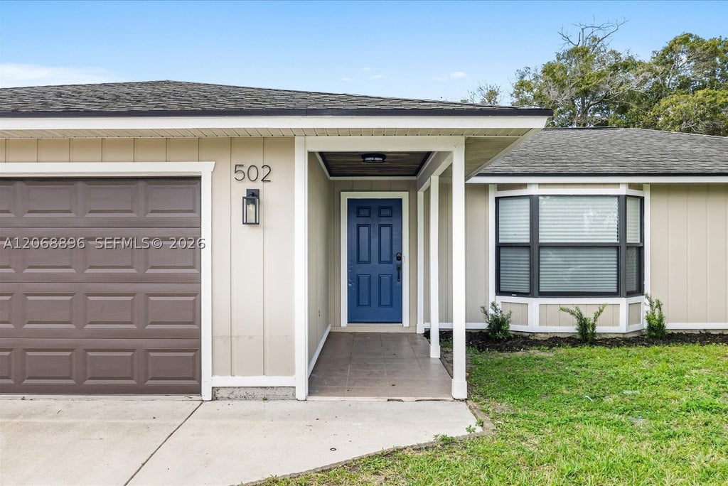 Photo of 502 NW Goldcoast Ave, Port St Lucie, FL 34983 (MLS # A12068896)