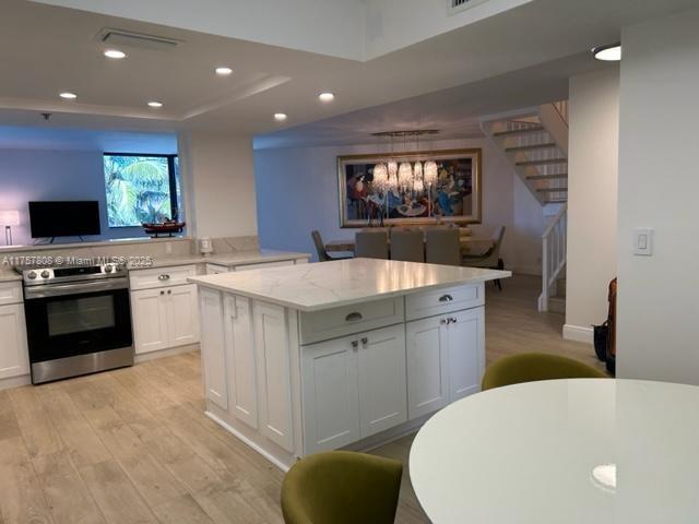 TOWNHOUSES OF HIGHLAND BE - Residential