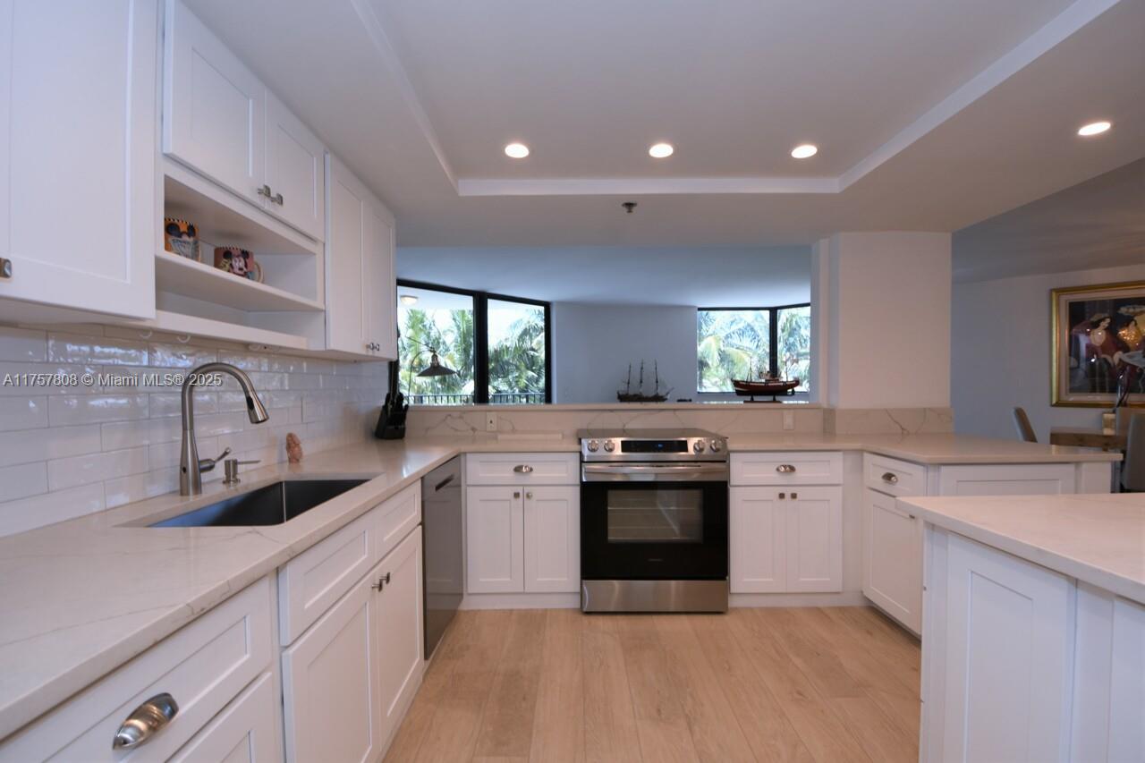 TOWNHOUSES OF HIGHLAND BE - Residential