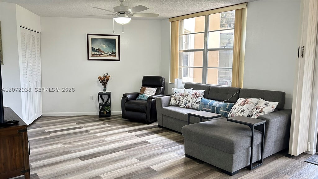 Photo of 1200 Saint Charles Pl #209, Pembroke Pines, FL 33026 (MLS # A12072938)