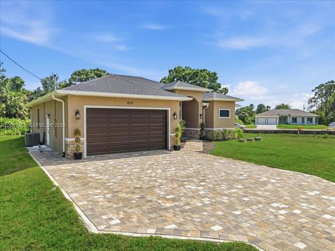 Tiny photo for 810 Sentinela Blvd, Lehigh Acres, FL 33974 (MLS # A12007309)