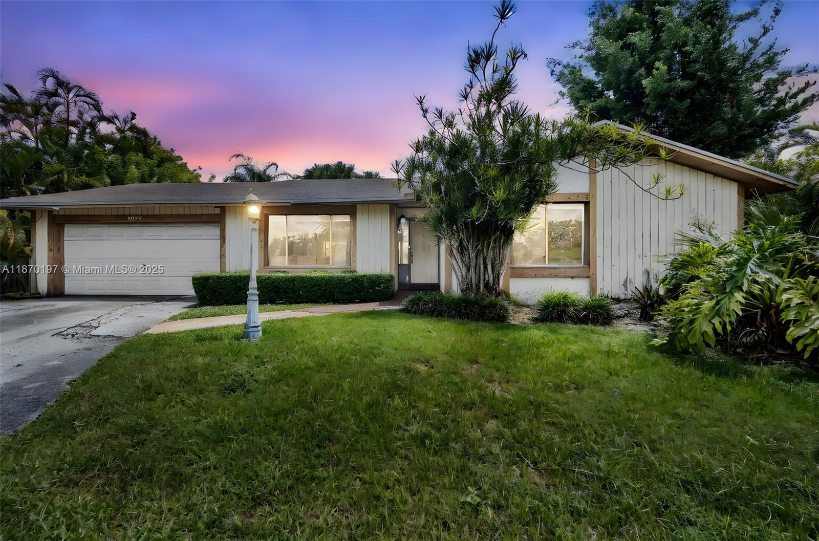 Welcome to 9935 SW 132nd Court in desirable Calusa Club Estates! This well maintained 4-bed, 3-bath home sits on an oversized 11,475 sq ft lot. The open layout is filled with natural light, featuring flowing living, dining, family, and kitchen areas, perfect for living or entertaining. Originally a 3/2, the converted garage with private entrance offers a versatile 4th bedroom for in-laws, office, or rental. The kitchen features wood cabinetry and granite countertops. The primary suite includes a walk-in closet and en-suite bath. Outdoors, enjoy lush landscaping, privacy fence, an oversized sparkling pool, with jacuzzi, and gazebo. Minutes from Turnpike, A+ schools, Baptist Hospital, shopping, and dining. Don’t miss this highly sought after Calusa pool home! Schedule your showing today.