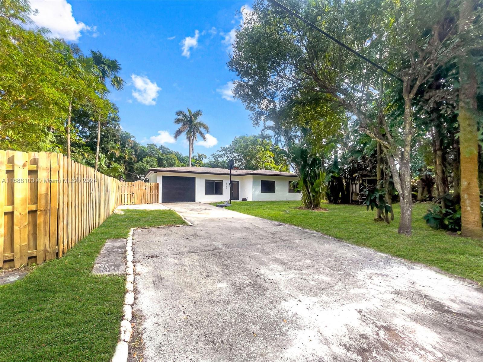 Welcome to this charming 4-bedroom, 3-bathroom ranch-style pool home in the sought-after Riverland neighborhood of Fort Lauderdale. Tucked along the scenic banks of the New River, Riverland offers peaceful, tree-lined streets shaded by arching palms and vibrant greenery, evoking the ambiance of a secluded tropical escape. This home features an open floor plan, tile flooring throughout, impact windows and doors, a lush tropical yard, and a newer roof. Ideally located near Downtown Las Olas, Fort Lauderdale’s air and seaport, schools, and major highways.