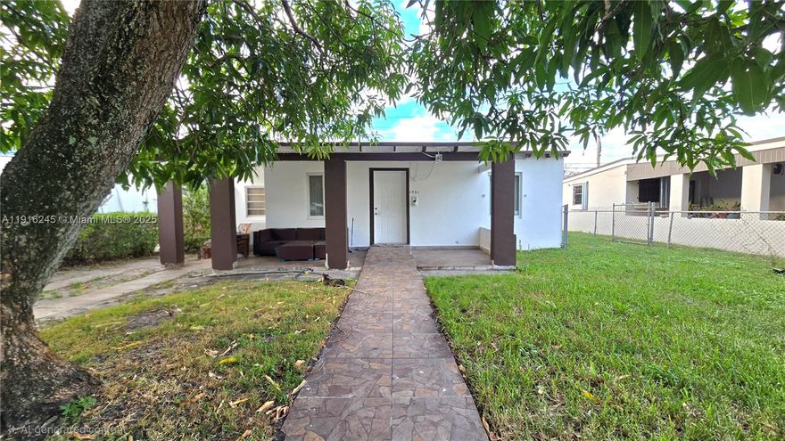 Single Family Home in Opa Locka 3-bedroom plus extra room, 2-bathroom in a 5,000 SF lot. No Association!!!. The property offers a welcoming front yard,  backyard, and covered carport. Conveniently located near Nathan B. Young Elementary and North Dade Middle School, it provides effortless access to I-95, shopping, restaurants, Flemarket, Food Market, and the Opa Locka Executive Airport. Situated in a non-flood zone. Ideal for families or investors. Property is currently FURNISHED; photos show it unfurnished. NO FHA qulified. Schedule a showing today.