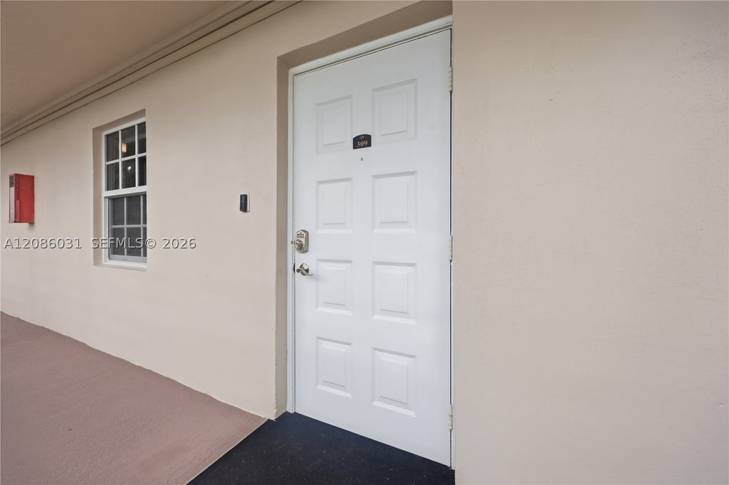 Photo of 555 Oaks Ln #309, Pompano Beach, FL 33069 (MLS # A12086031)