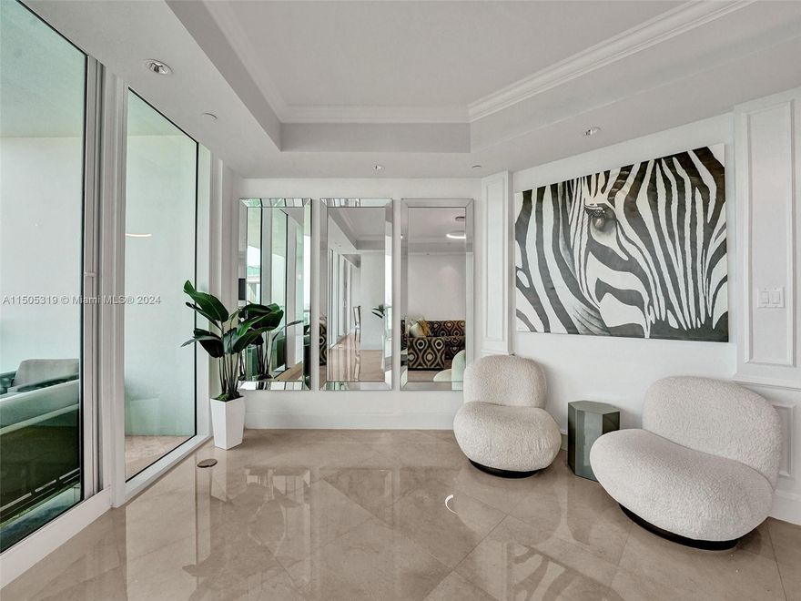 Welcome to this casually elegant 3-bedroom, 5-bathroom home In Porto Vita. This spacious 3300-square-foot residence has been refreshed, buffed, painted, and lightened up, offering a truly luxurious living experience. Floor-to-ceiling windows provide breathtaking views of the Atlantic Ocean, Golden Beach, and the Intracoastal, on the west side, stunning Miami sunset and golf course views. Porto Vita boasts an impressive list of amenities: common garden, doorman, concierge, private elevator, gym, pool, hot tub, sauna, basketball, Tennis and pickle ball courts, yoga pilates and Zumba, resident's lounge, on-site restaurant, spa, valet parking, security gate, facialists, masseuses and more. There is also a Housekeeper's room and extra storage for the unit.