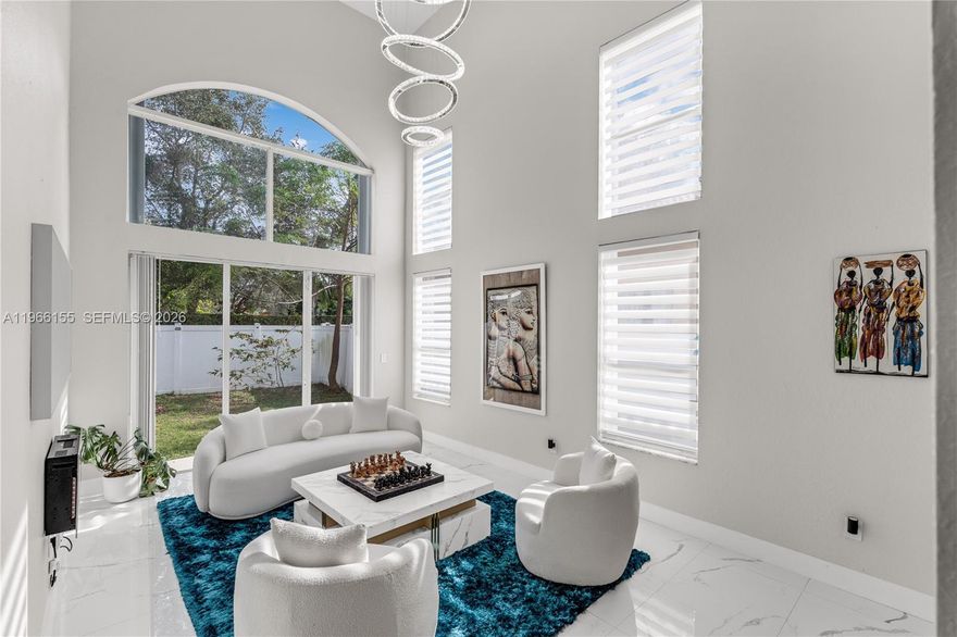 (LISTED UNDER APPRAISED VALUE) READY FOR A NEW OWNER Located in the desirable Portofino Oaks at the Waterstone Community, this fully updated, modern single-family home offers high ceilings, tile flooring on both levels, and a generous, open layout for comfortable living. The first floor features a formal living and dining room, one bedroom and one full bathroom, a large family room, a well-appointed kitchen with stainless steel appliances, a laundry room, an additional pantry/storage closet, and a 3-car garage. A patio with a pergola provides an ideal outdoor space for relaxation or entertaining. The second floor hosts four spacious bedrooms and two full bathrooms. The primary suite includes a large bathroom and a walk-in closet. Additional highlights include a recent A/C upgrade (1 year old, 5-ton unit) and a roof installed in 2021. Conveniently located near the Florida Turnpike, Baptist Hospital, shopping centers, schools, and more.