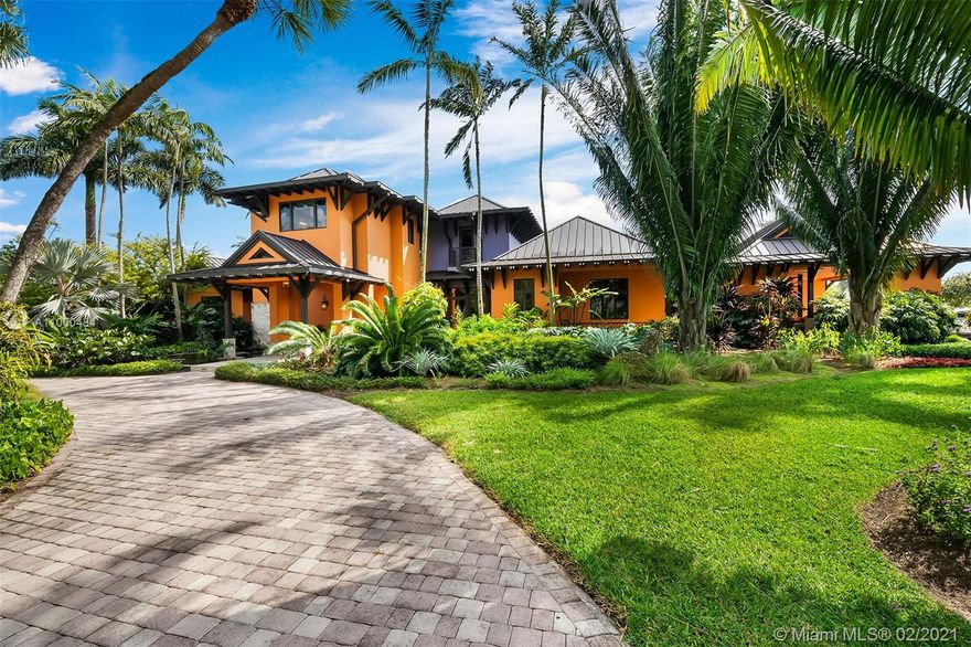 Sensational 10-acre+/- estate in the Redland is filled with local and exotic flowering trees and plants. Artistic entry gates welcome all and foretell the enchantment that awaits as you follow the road past two sizable koi ponds up to the main house. Designed by Charles Harrison Pawley the main house offers coffered and vaulted ceilings, Brazilian cherry floors and large living areas including the office/family room and a wonderful kitchen with top-of-the-line Wolfe and Sub-Zero appliances. Take the stairs or the elevator up to the master suite offering his/her closets, luxurious master bath and a screened-in porch overlooking the pool and waterfall. Additional features include a detached 1b/1b Guest Cottage, entertainment pavilion, another 3b/2b staff house, and 80KW full house generator.