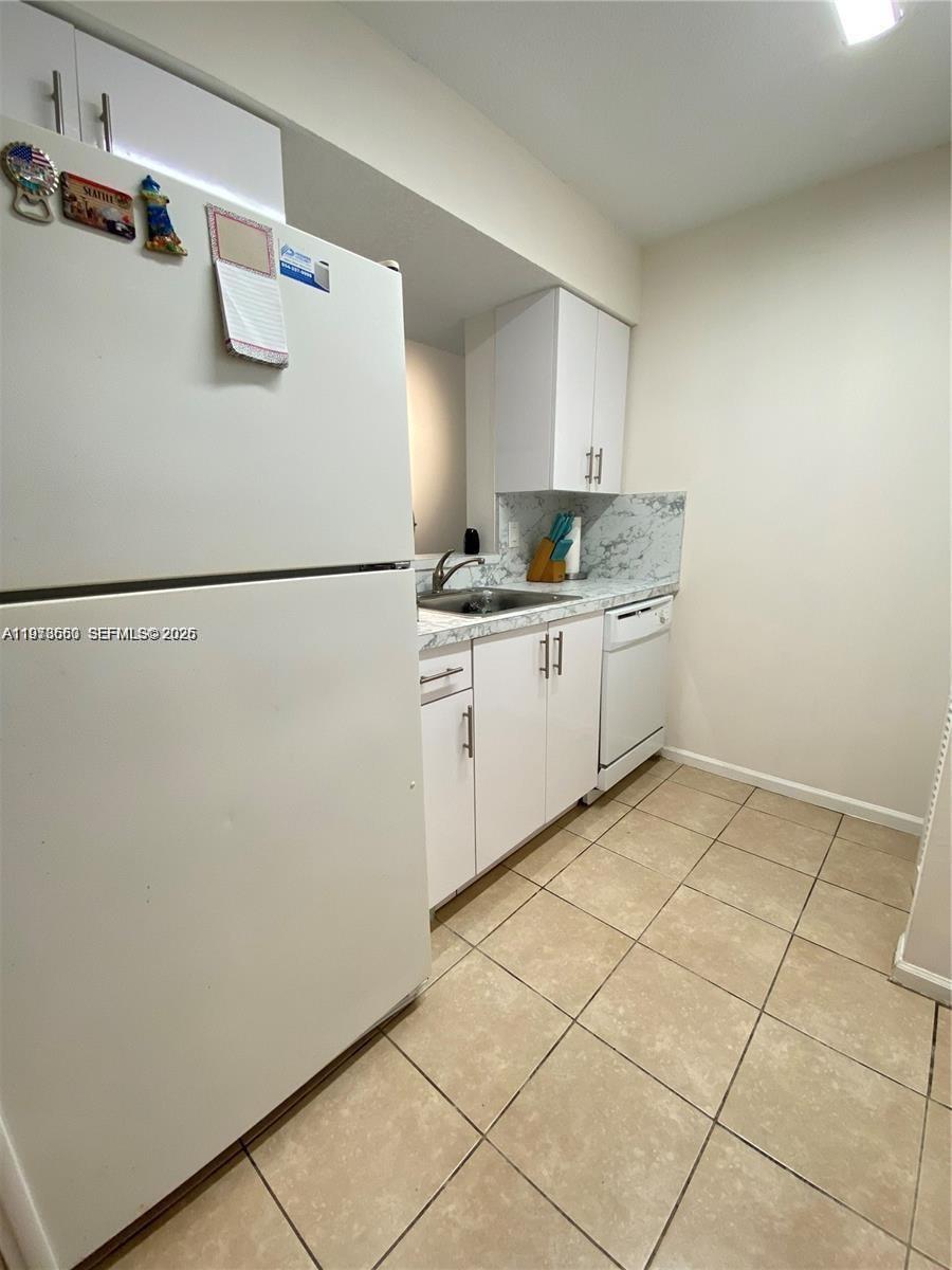 SHERIDAN EAST CONDO BLDG - Residential Lease